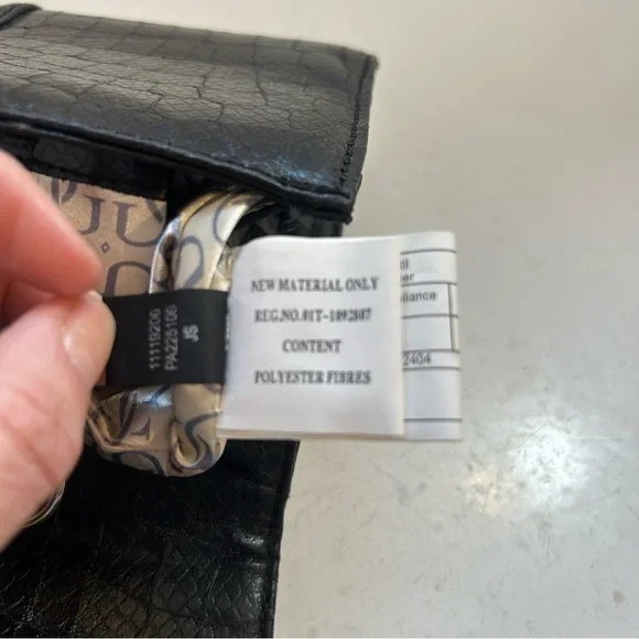 Guess women’s black animal print jewelled clutch - Picture 10 of 12